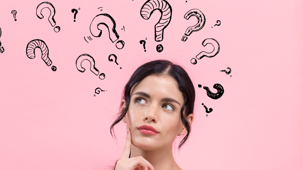 Young woman looking up and to her right, her head surrounded by hand-drawn question marks.